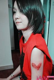 Girl creative fingerprint red heart arm tattoo picture