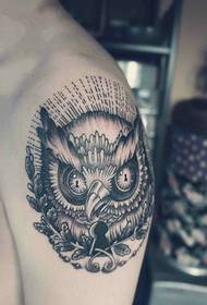 Creative owl key arm tattoo picture