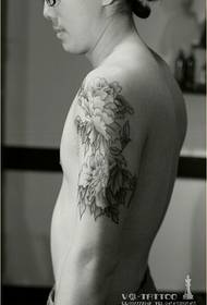 Mandlig arm mode sort grå pæon tatovering billede