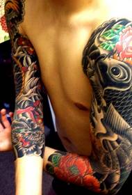 Stylish and beautiful squid flower arm tattoo