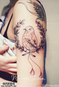 Small fresh bird tattoo illustration