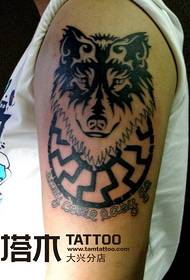 Arm wolf totem tattoo