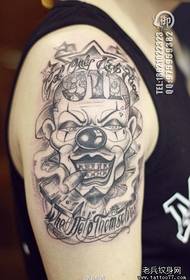 Arm black grey clown tattoo na larawan