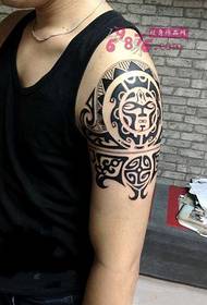 Boy Maya Totem Arm Tattoo Picture