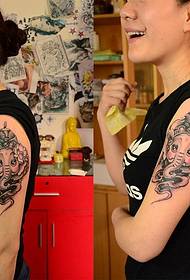 Good-looking elephant tattoo on the arm