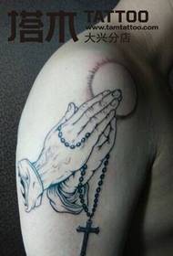 男生手臂祈祷纹身图案