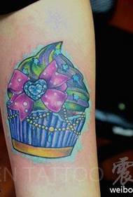 Arm color bow cake tattoo pattern