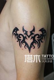 Arm bat totem tattoo