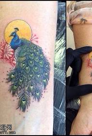 Foto dị na agba peacock tattoo tattoo