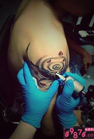 Man arm inkfish personality tattoo scene