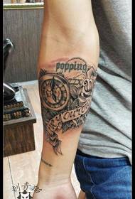 Arm compass rose letter tattoo pattern