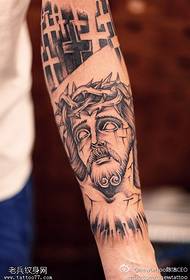 Arm point thorn idelens bloem Jezus tattoo patroan