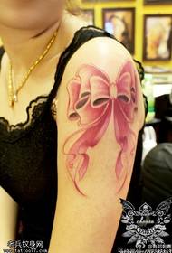 Pictiúr dath tattoo bogha lámh baineann