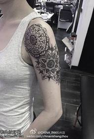 Female arm fan flower tattoo pattern