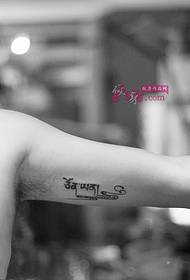 Vintage Tibetan black and white arm tattoo picture