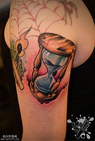 Arm ruvara hourglass tattoo maitiro