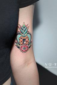 Arm color small pineapple tattoo work