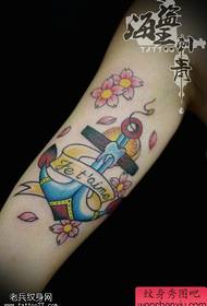 Tattoo show, recommend a colorful anchor letter tattoo