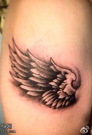 Spettacolo di tatuaggi, consiglia un'immagine del braccio e delle ali
