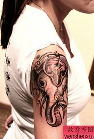 a woman's arm like a god tattoo pattern