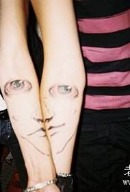 Couple arm eyes tattoo pattern
