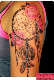 Arm dream catcher tattoo