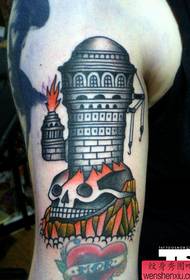 Brazo creativo cráneo alta torre tatuaje funciona