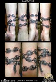 Arm classicu un mudellu di tatuaggi di braccialetto Baba