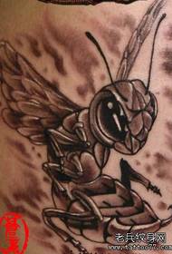 An arm bee tattoo pattern