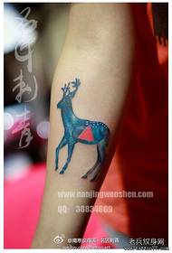 Arm style wāhina deer tattoo pattern