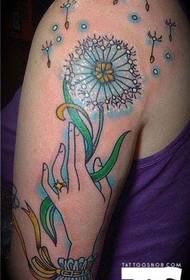 Lengan karya tato tangan dandelion yang kreatif