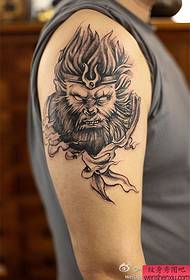 Tatouage de singe à gros bras