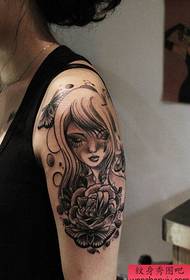 Kaki tato wanita ireng lan putih badut kriya sing dituduhake tattoo