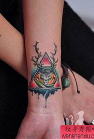 Arm antilope god eye tattoo werk