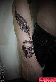 arm personality skull feather tattoo pattern