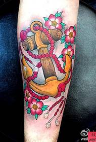 Bar tayangan tato merekomendasikan pola tato jangkar warna lengan