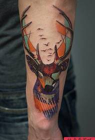 Arm color deer tattoo works