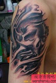 male arm personality skull tattoo pattern