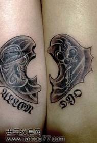 Modello tatuaggio braccio coppia amore serratura a chiave