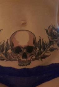 腹部紋身女孩腹部植物和頭骨紋身圖片