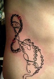 modello di tatuaggio perlina pancia personale