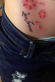 malgranda tatuaje de ĉerizo-florado kun tatuaje sur la abdomeno