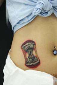 kreative hourglass belly tattoo