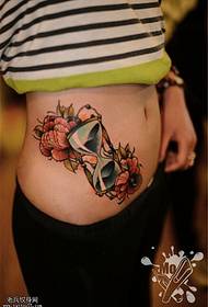 modèle de tatouage rose féminin sablier école de couleur abdomen