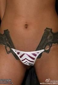 two pistol tattoo designs in the sexy part