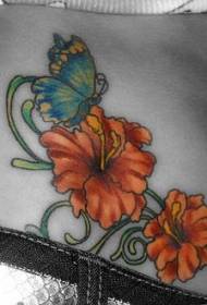 腹部蝴蝶和橙花紋身圖案