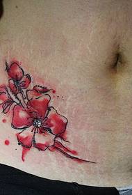 birth flower tattoo for the caesarean section of the caesarean