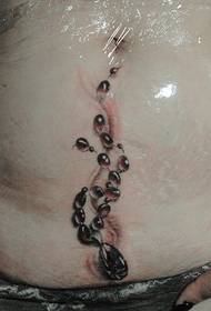 djevojka trbuh dijamant lanac tetovaža uzorak