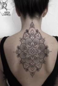 girl's back black grey point tattooed tattoo picture