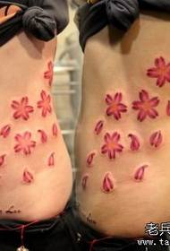 gyönyörű hasa az derék oldalán gyönyörű színű cseresznyevirág tetoválás mintával